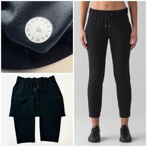 Lululemon On The Fly Pant Woven Wrinkle Free Slim Cropped 
Pockets Black